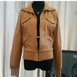 Size small light tan leather jacket